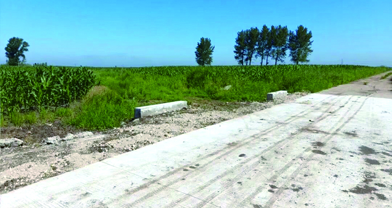 整改后 涵洞笔直顺畅衔接水渠 农田恢复种植