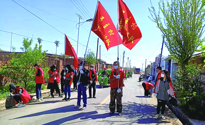 二题图,村党支部举办党员志愿服务活动